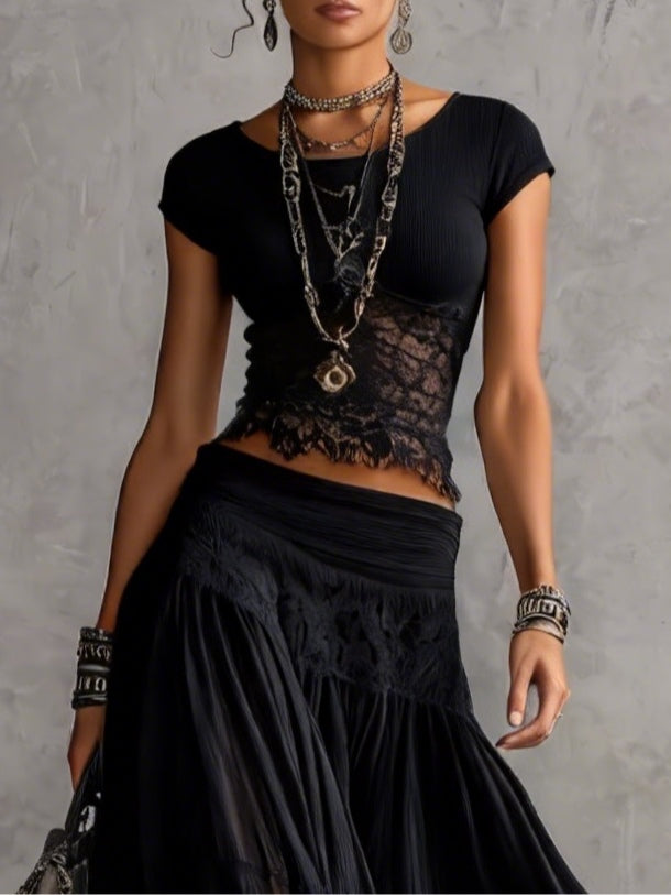 Geneva · Set consisting of a transparent top with black lace panels and a maxi pleated skirt